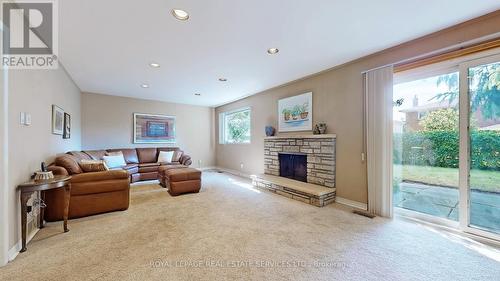 65 Covewood Street, Toronto, ON - Indoor Photo Showing Living Room With Fireplace