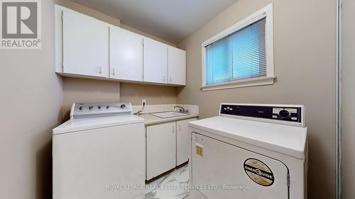 65 Covewood Street, Toronto, ON - Indoor Photo Showing Laundry Room