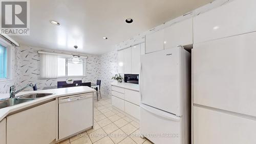 65 Covewood Street, Toronto, ON - Indoor Photo Showing Kitchen With Double Sink