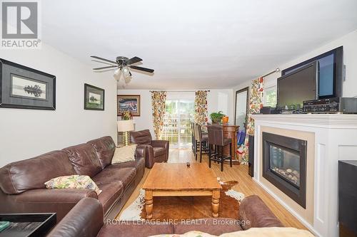 115 Elmwood Avenue, Fort Erie, ON - Indoor Photo Showing Living Room With Fireplace