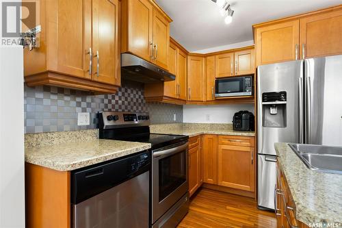 5028 Aerial Crescent, Regina, SK - Indoor Photo Showing Kitchen With Double Sink