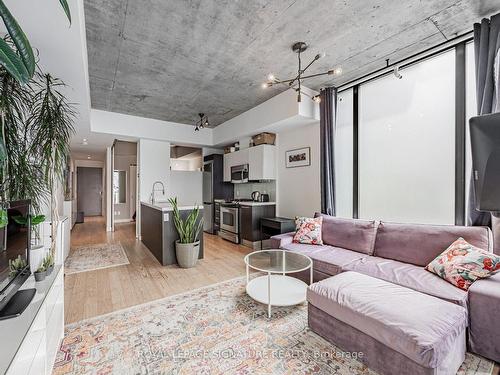 804-25 Stafford St, Toronto, ON - Indoor Photo Showing Living Room With Fireplace