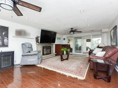 2477 Islington Ave, Toronto, ON - Indoor Photo Showing Living Room With Fireplace