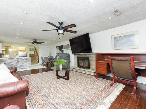 2477 Islington Ave, Toronto, ON - Indoor Photo Showing Living Room With Fireplace