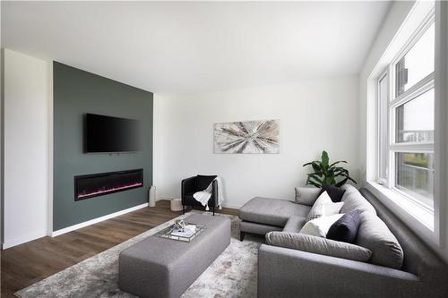 155 Grey Heron Drive, Winnipeg, MB - Indoor Photo Showing Living Room With Fireplace