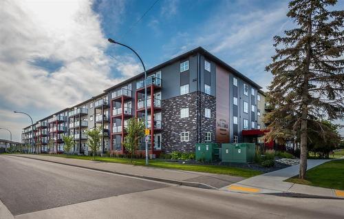 220 670 Hugo Street, Winnipeg, MB - Outdoor With Balcony With Facade