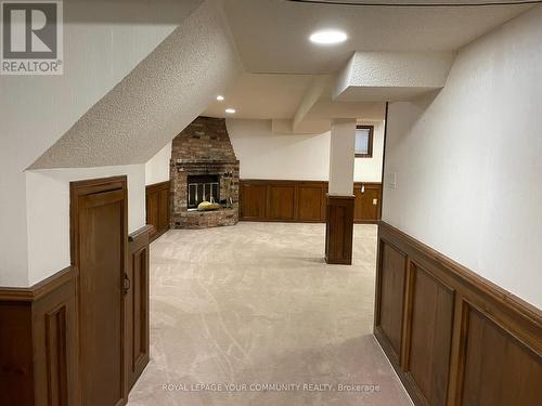 146 Wintermute Boulevard, Toronto, ON - Indoor Photo Showing Other Room With Fireplace