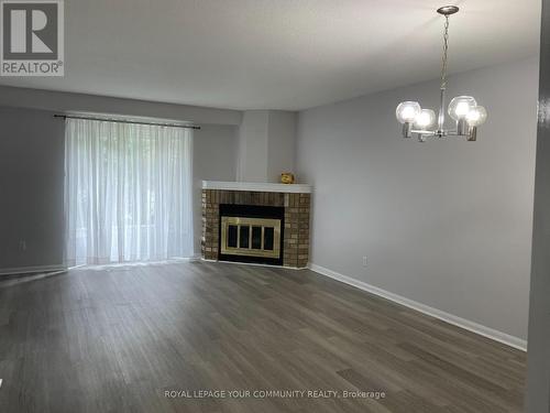 146 Wintermute Boulevard, Toronto, ON - Indoor Photo Showing Living Room With Fireplace