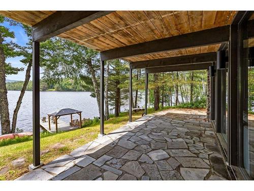 Terrasse - 121 Ch. Du Lac-Ouimet, Mont-Tremblant, QC - Outdoor With Body Of Water With Exterior