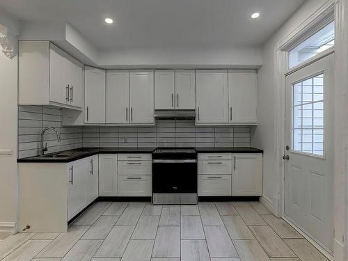 Cuisine - 2010 Av. Laurier E., Montréal (Le Plateau-Mont-Royal), QC - Indoor Photo Showing Kitchen With Double Sink