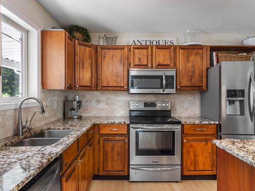 9049 Kealty Road, Kamloops, BC - Indoor Photo Showing Kitchen With Double Sink