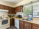 23-931 Gleneagles Drive, Kamloops, BC  - Indoor Photo Showing Kitchen With Double Sink 