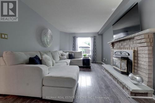 483 Saginaw Parkway, Cambridge, ON - Indoor Photo Showing Living Room With Fireplace