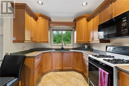 608 Brenda, Greater Sudbury, ON - Indoor Photo Showing Kitchen With Double Sink