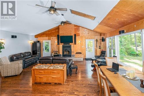 298 Whippoorwill Road, Alban, ON - Indoor Photo Showing Living Room With Fireplace