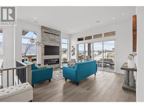 3569 Sagehill Court, Kelowna, BC - Indoor Photo Showing Living Room With Fireplace