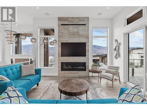 3569 Sagehill Court, Kelowna, BC - Indoor Photo Showing Living Room With Fireplace