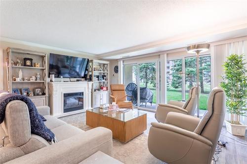 5280 Lakeshore Road|Unit #102, Burlington, ON - Indoor Photo Showing Living Room With Fireplace