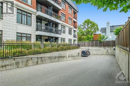 underground entrance with onsite visitors parking - 323 Winona Avenue Unit#203, Ottawa, ON - Outdoor With Balcony