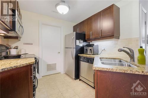 323 Winona Avenue Unit#203, Ottawa, ON - Indoor Photo Showing Kitchen With Double Sink