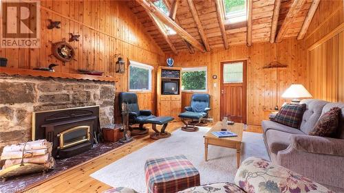 123 Pine Tree Harbour Road, Northern Bruce Peninsula, ON - Indoor Photo Showing Living Room With Fireplace