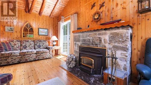 123 Pine Tree Harbour Road, Northern Bruce Peninsula, ON - Indoor Photo Showing Living Room With Fireplace