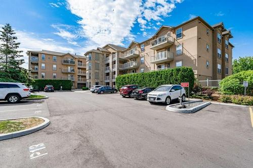 1450 Bishops Gate|Unit #101, Oakville, ON - Outdoor With Balcony With Facade