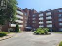 401 - 198 Scott Street N, St. Catharines, ON  - Outdoor With Balcony With Facade 