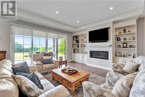 285794 Airport Road, Norwich, ON - Indoor Photo Showing Living Room With Fireplace