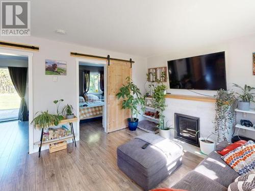 4589 Joyce Ave, Powell River, BC - Indoor Photo Showing Living Room With Fireplace