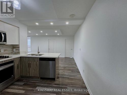 2208 - 4090 Living Arts Drive, Mississauga, ON - Indoor Photo Showing Kitchen With Double Sink