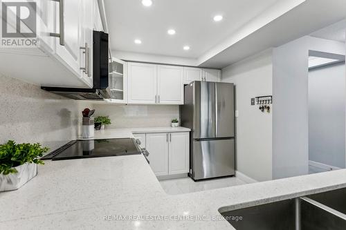 308 - 24 Hanover Road, Brampton, ON - Indoor Photo Showing Kitchen With Upgraded Kitchen
