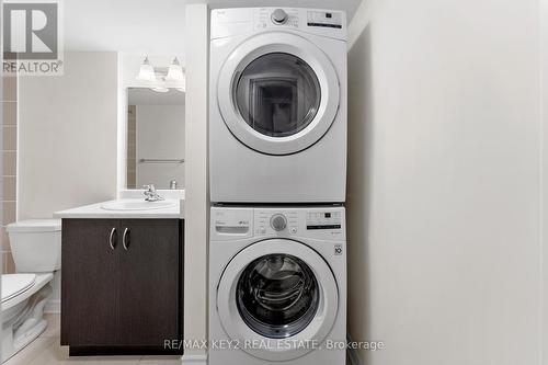 407 - 2789 Eglinton Avenue E, Toronto, ON - Indoor Photo Showing Laundry Room