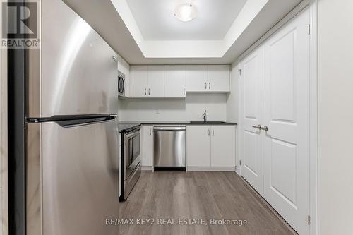 407 - 2789 Eglinton Avenue E, Toronto, ON - Indoor Photo Showing Kitchen With Stainless Steel Kitchen