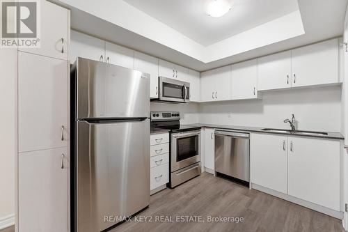 407 - 2789 Eglinton Avenue E, Toronto, ON - Indoor Photo Showing Kitchen With Stainless Steel Kitchen