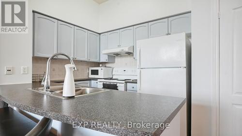 201 - 50 Brian Harrison Way, Toronto, ON - Indoor Photo Showing Kitchen