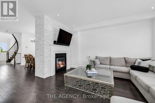 2 Leith Drive, Bradford West Gwillimbury, ON - Indoor Photo Showing Living Room With Fireplace
