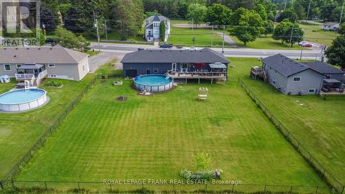 484 Ennis Road, Smith-Ennismore-Lakefield, ON - Outdoor With Above Ground Pool With Backyard