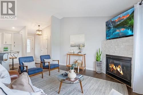 484 Ennis Road, Smith-Ennismore-Lakefield, ON - Indoor Photo Showing Living Room With Fireplace