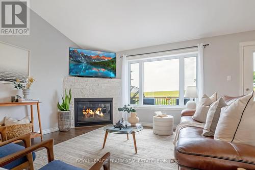 484 Ennis Road, Smith-Ennismore-Lakefield, ON - Indoor Photo Showing Living Room With Fireplace