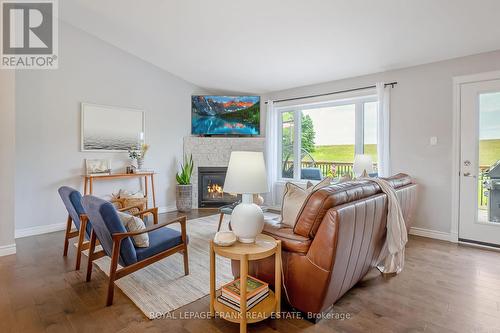 484 Ennis Road, Smith-Ennismore-Lakefield, ON - Indoor Photo Showing Living Room With Fireplace