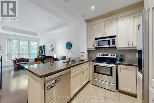 223 - 20 Burkebrook Place, Toronto, ON - Indoor Photo Showing Kitchen With Double Sink