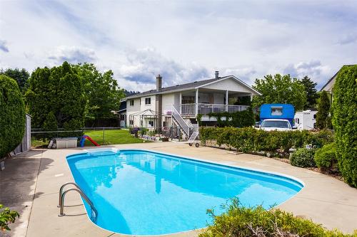 465 O'Keefe Court, Kelowna, BC - Outdoor With In Ground Pool With Deck Patio Veranda With Backyard