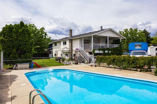 465 O'Keefe Court, Kelowna, BC - Outdoor With In Ground Pool With Deck Patio Veranda With Backyard