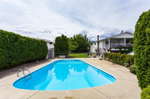 465 O'Keefe Court, Kelowna, BC - Outdoor With In Ground Pool With Deck Patio Veranda