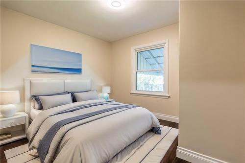 virutally staged bedroom - 166 East 34Th Street, Hamilton, ON - Indoor Photo Showing Bedroom
