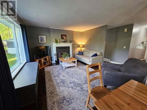 6561 Dokkie Subdivision, Chetwynd, BC - Indoor Photo Showing Living Room With Fireplace