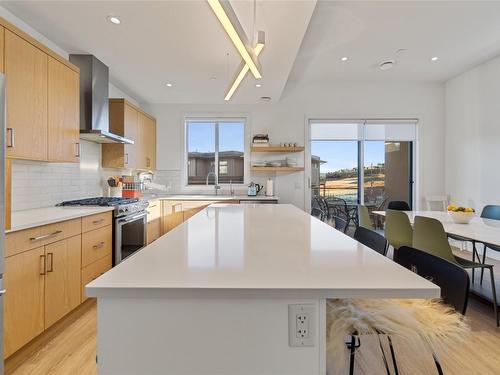1-105 Predator Ridge Drive, Vernon, BC - Indoor Photo Showing Kitchen With Upgraded Kitchen