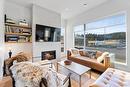 1-105 Predator Ridge Drive, Vernon, BC  - Indoor Photo Showing Living Room With Fireplace 