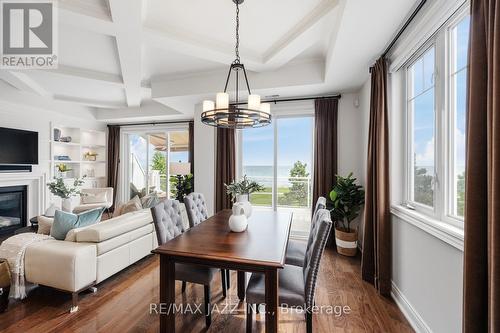 Unit 1 - 365 Lakebreeze Drive, Clarington, ON - Indoor Photo Showing Dining Room With Fireplace